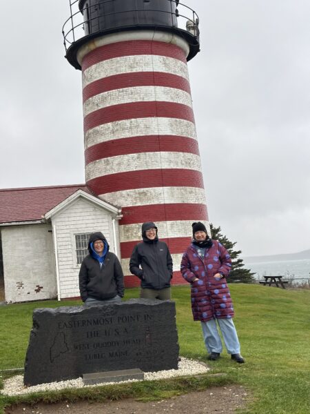 Author and illustrator Jamie Hogan in in Maine at Quoddy Head Light