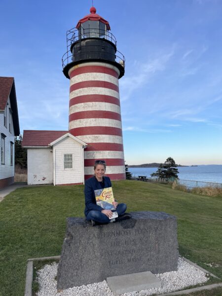 Author Anna Crowley Redding in Maine at Quoddy Head Light